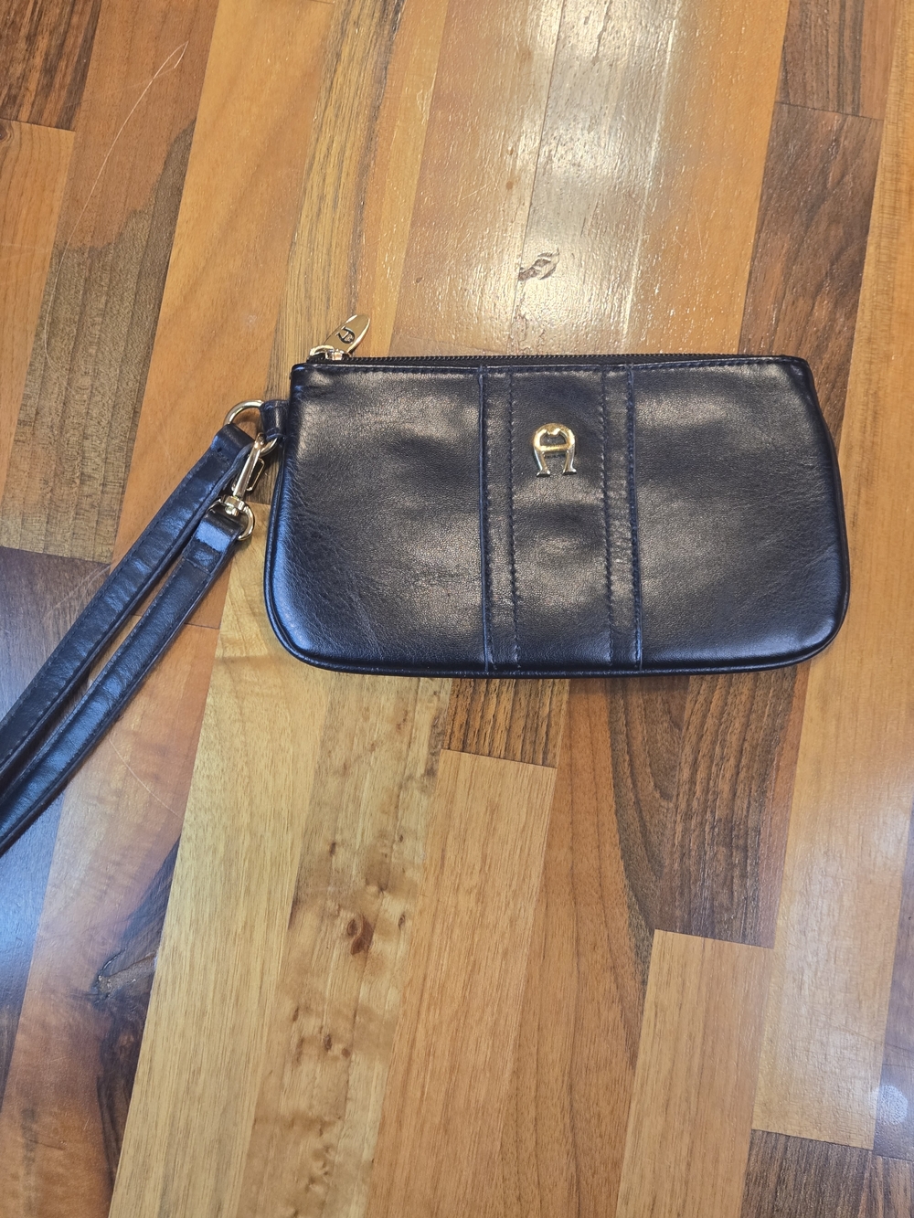 Etienne Aigner Black Wristlet with Gold Horseshoe